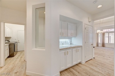 Explore this immaculately updated townhome in Sun City Summerlin