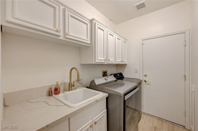 Explore this immaculately updated townhome in Sun City Summerlin