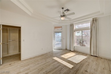 Explore this immaculately updated townhome in Sun City Summerlin