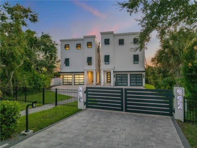 Experience the ultimate in luxury waterfront living with this