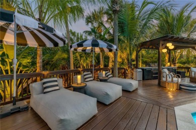 Experience the ultimate in luxury waterfront living with this