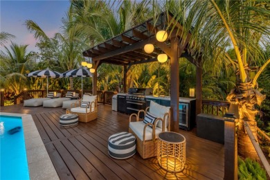 Experience the ultimate in luxury waterfront living with this