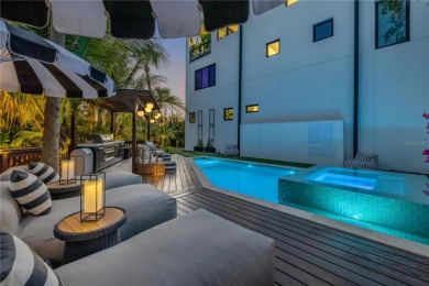 Experience the ultimate in luxury waterfront living with this