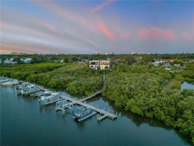 Experience the ultimate in luxury waterfront living with this