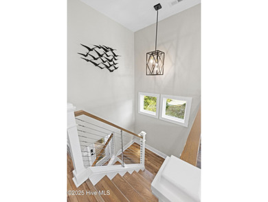 Experience the best of coastal living in this custom-built