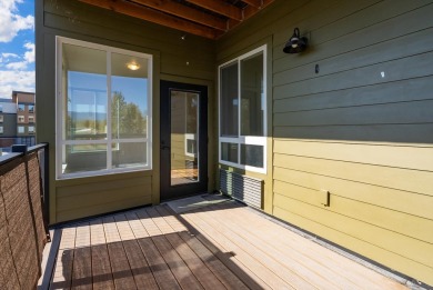 Enjoy effortless living in this beautifully designed corner unit