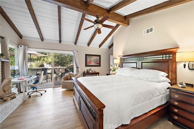 Spectacular single-level split-wing home featuring 4 bedrooms