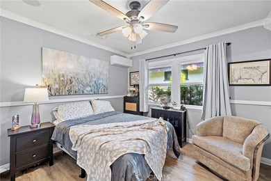 Spectacular single-level split-wing home featuring 4 bedrooms