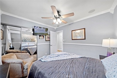 Spectacular single-level split-wing home featuring 4 bedrooms