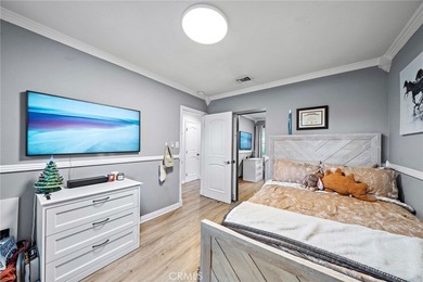 Spectacular single-level split-wing home featuring 4 bedrooms