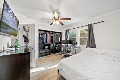 Spectacular single-level split-wing home featuring 4 bedrooms