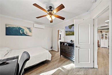 Spectacular single-level split-wing home featuring 4 bedrooms