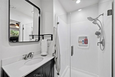 Spectacular single-level split-wing home featuring 4 bedrooms