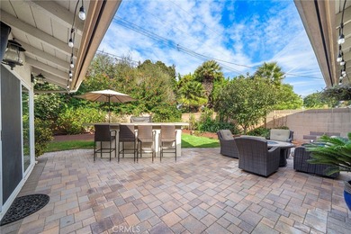 Spectacular single-level split-wing home featuring 4 bedrooms