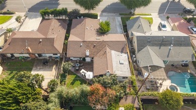 Spectacular single-level split-wing home featuring 4 bedrooms