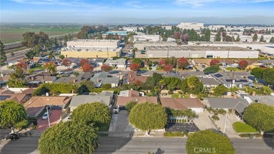 Spectacular single-level split-wing home featuring 4 bedrooms