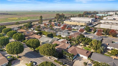 Spectacular single-level split-wing home featuring 4 bedrooms