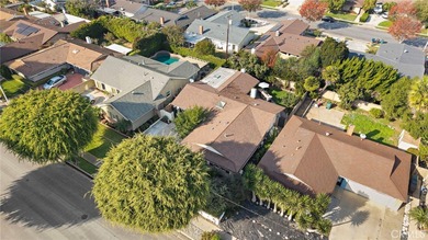 Spectacular single-level split-wing home featuring 4 bedrooms