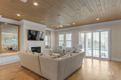 Just steps from the sugar-white sands of the Gulf, this