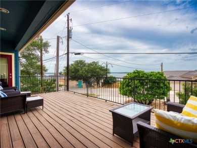 Experience lake living at its finest in this beautifully updated