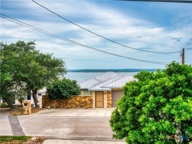 Experience lake living at its finest in this beautifully updated