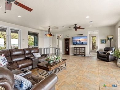 Experience lake living at its finest in this beautifully updated