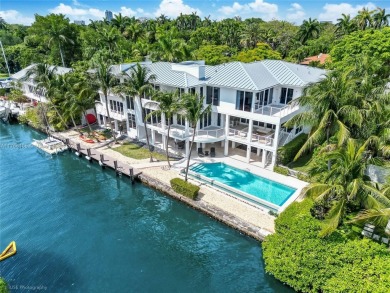 A private tropical oasis--waterfront estate with 150 FT of water