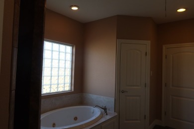 Beautiful Custom Home on the 14th green at the Flying L Ranch