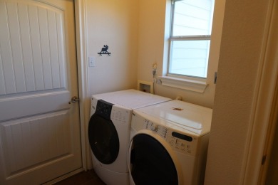 Beautiful Custom Home on the 14th green at the Flying L Ranch