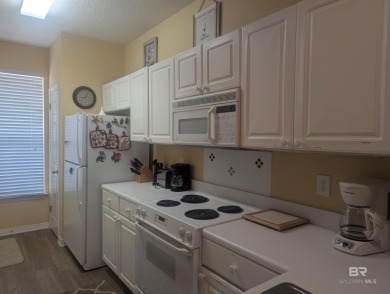 Motivated Seller! This spacious 2BR/2BA ground-floor condo