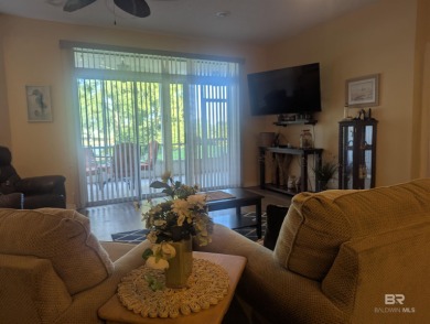 Motivated Seller! This spacious 2BR/2BA ground-floor condo