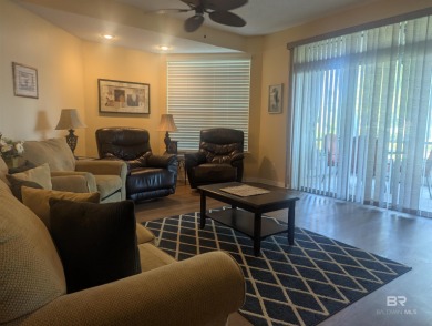 Motivated Seller! This spacious 2BR/2BA ground-floor condo