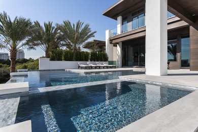 Experience the pinnacle of luxury coastal living in this