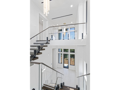 Experience the pinnacle of luxury coastal living in this