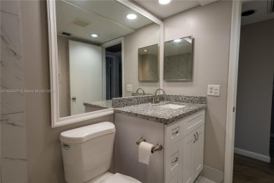 Spacious 2 bedroom 2 bath with large ENCLOSED BALCONY , storage