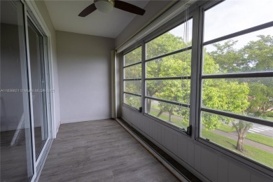 Spacious 2 bedroom 2 bath with large ENCLOSED BALCONY , storage