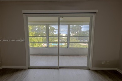 Spacious 2 bedroom 2 bath with large ENCLOSED BALCONY , storage