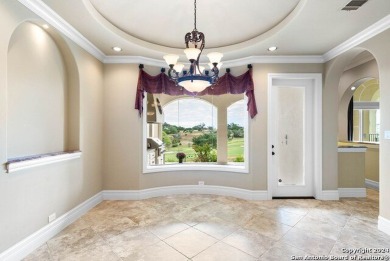 Elegantly situated on the 18th hole of Comanche Trace's