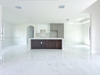 Welcome to your dream home in Lehigh Acres! This elegant