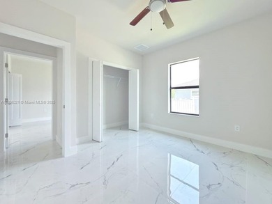 Welcome to your dream home in Lehigh Acres! This elegant