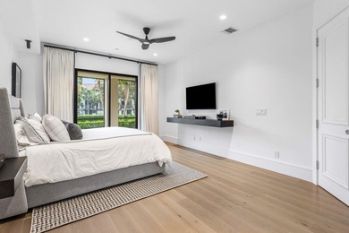 Beyond the private gates of Boca Grove Country Club, a residence