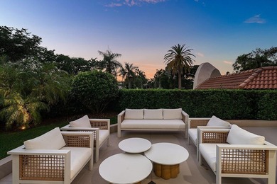 Beyond the private gates of Boca Grove Country Club, a residence