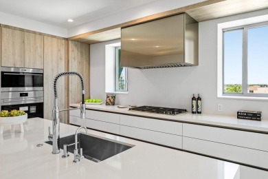 Discover an exceptional residence in the sought-after East Tower