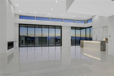 Welcome to 641 Majestic Rim Drive, a modern sanctuary of