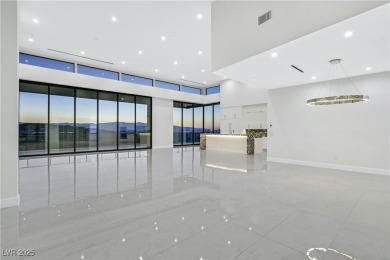 Welcome to 641 Majestic Rim Drive, a modern sanctuary of