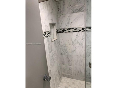 Beautifully updated 1-bedroom, 1.5-bath condo in the desirable