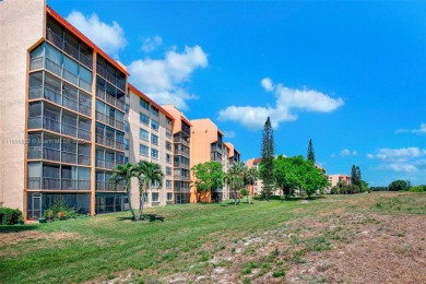 BEAUTIFUL 2/2 CONDO - ENCLOSED AND SCREENED BALCONY WITH VIEW ON
