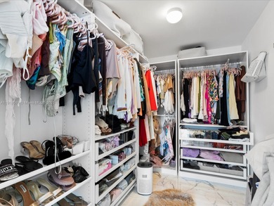 Welcome home to this immaculate 3 bedroom 3 bath condo perched