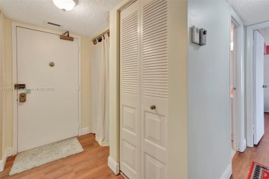 BEAUTIFUL 2/2 CONDO - ENCLOSED AND SCREENED BALCONY WITH VIEW ON