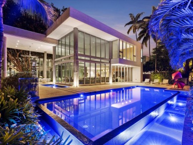 Set on prestigious Rio Vista Boulevard, this modern estate